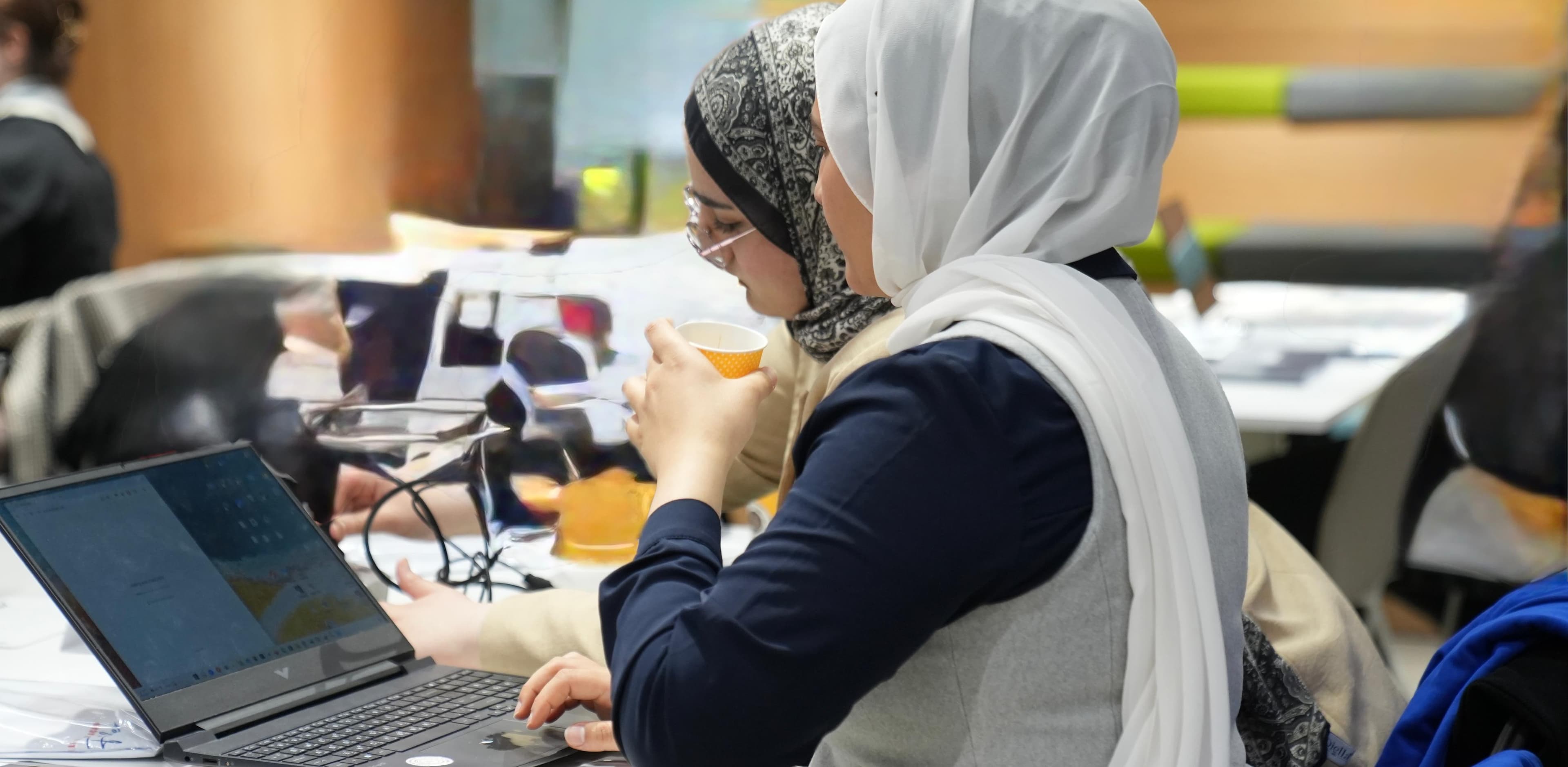 Alaa Madi collaborating at a workshop
